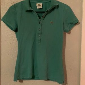 teal Lacoste shirt